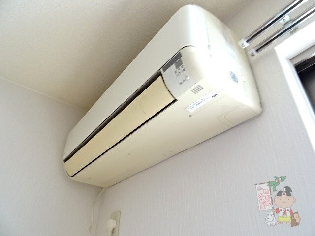 拡大写真:津倉町貸家 1階1のエアコン