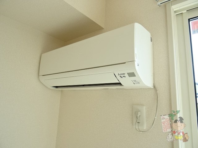 拡大写真:エパル三門 1階106のエアコン