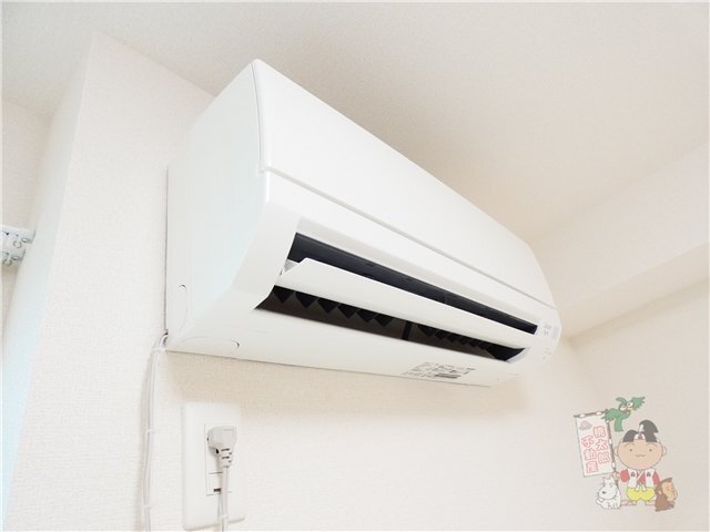 拡大写真:アルネオ 1階1のエアコン