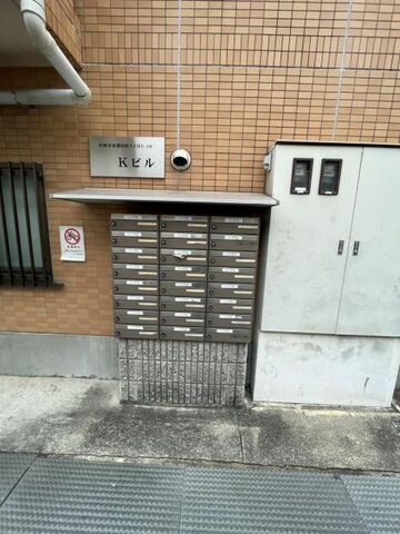 拡大写真:Kビル 2階211の外観写真(昼)