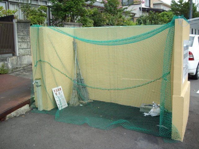 拡大写真：新居浜市七宝台町 2階207の外観写真（昼）