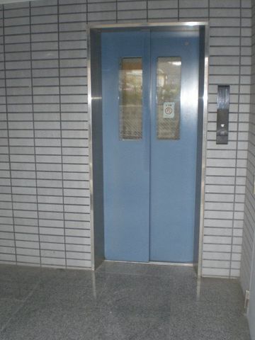 拡大写真：唐津市新興町 3階501の外観写真（昼）