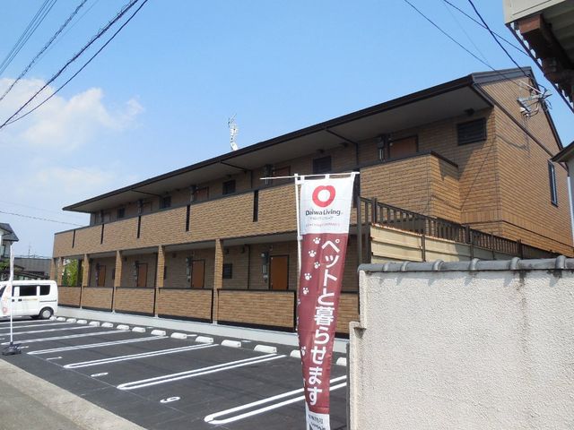 拡大写真：都城市南鷹尾町 2階205の外観写真（昼）