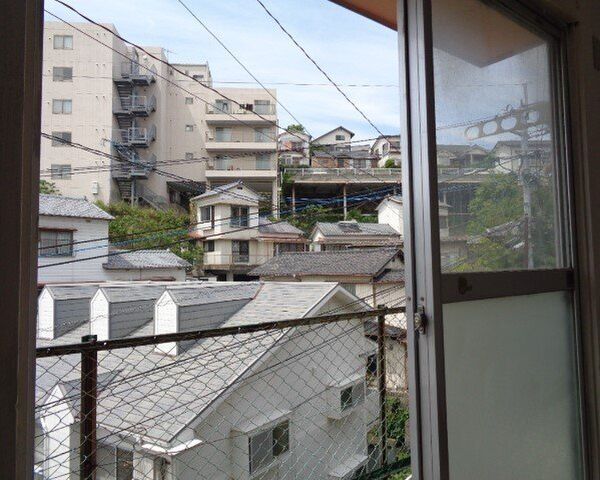 拡大写真：佐世保市若葉町 2階203の外観写真（昼）