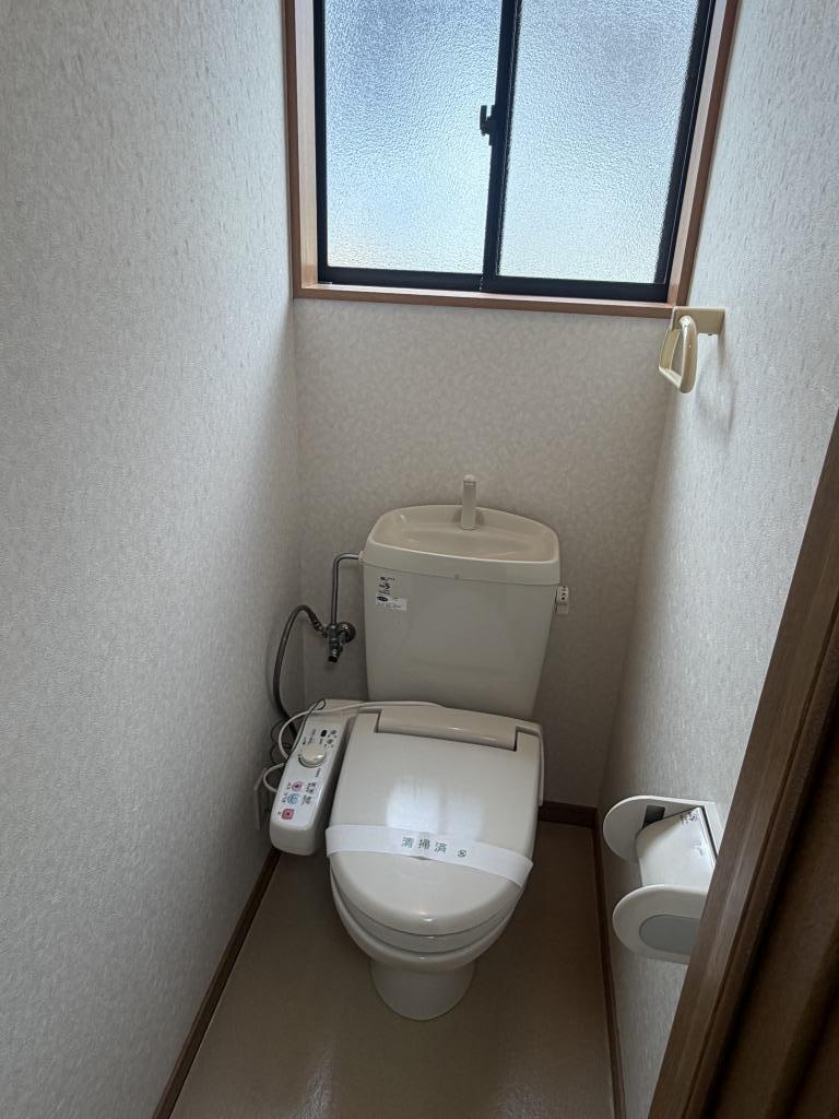 拡大写真:エスティー長峰 2階203の温水洗浄便座