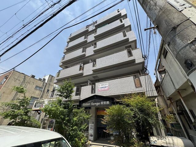 拡大写真:サンセルジュ香里園 4階403の外観写真(昼)