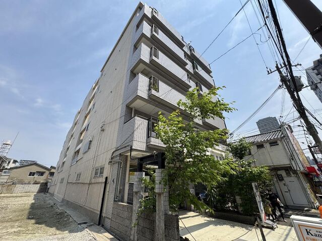 拡大写真:サンセルジュ香里園 4階403の外観写真(昼)