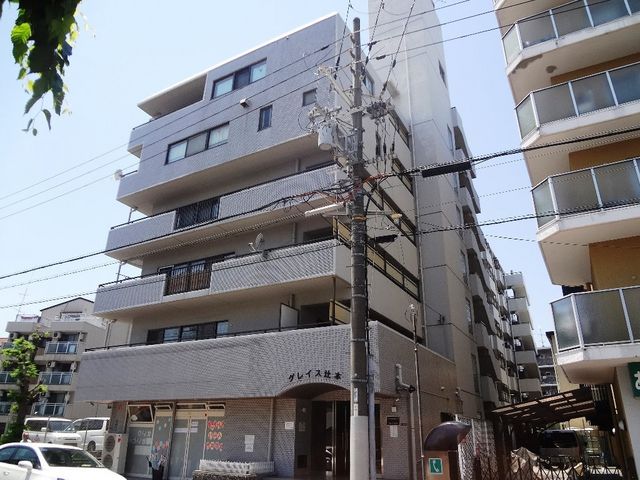 拡大写真：グレイス辻本 6階607の外観写真（昼）