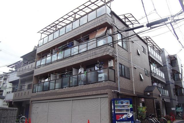 拡大写真：ニューハイツ桜Ⅳ 4階401の外観写真（昼）