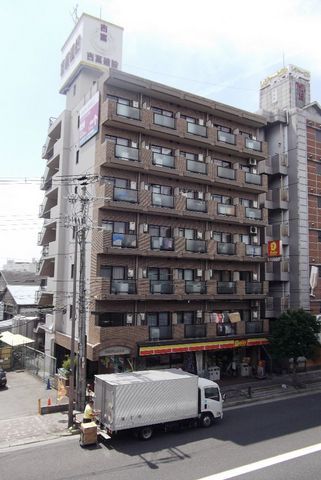 拡大写真：門真プラザ 4階406の外観写真（昼）