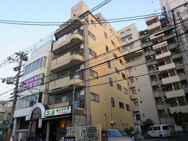 拡大写真：コーポラス野里 5階501の外観写真（昼）
