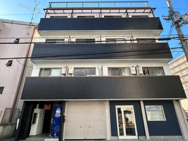 拡大写真：寝屋川市池田中町 4階503の外観写真（昼）