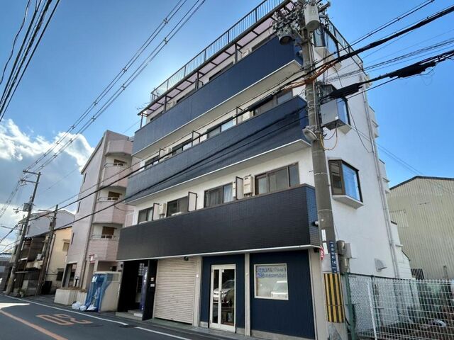 拡大写真：寝屋川市池田中町 4階503の外観写真（昼）