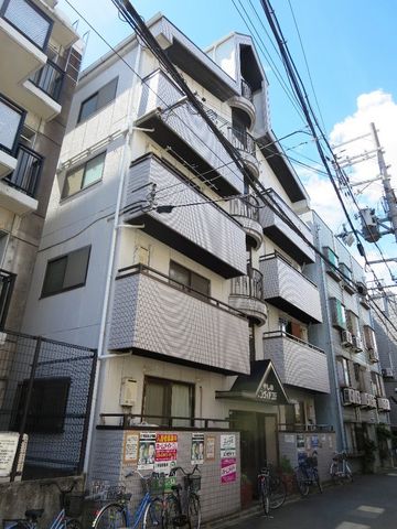 拡大写真：萱島サンヴィアンテ 2階201の外観写真（昼）