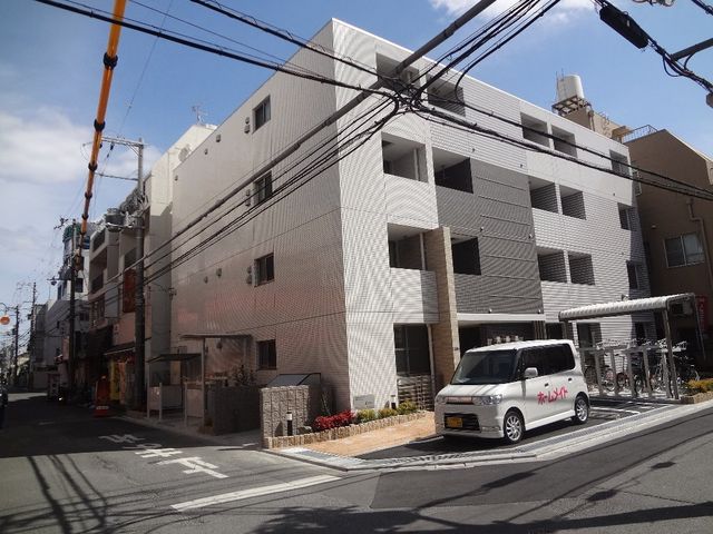 拡大写真：アプリコット野里 3階301の外観写真（昼）
