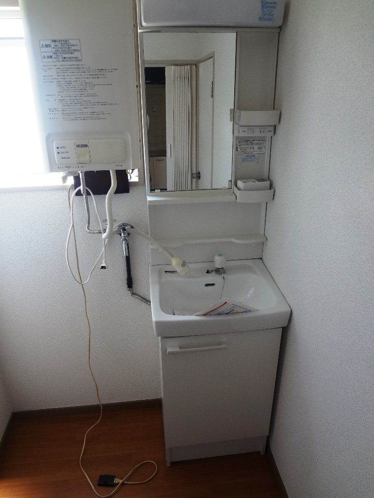 拡大写真：ロイヤル北斗 2階306の洗髪洗面化粧台