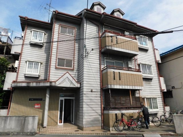 拡大写真：四條畷市南野４丁目 3階302の外観写真（昼）