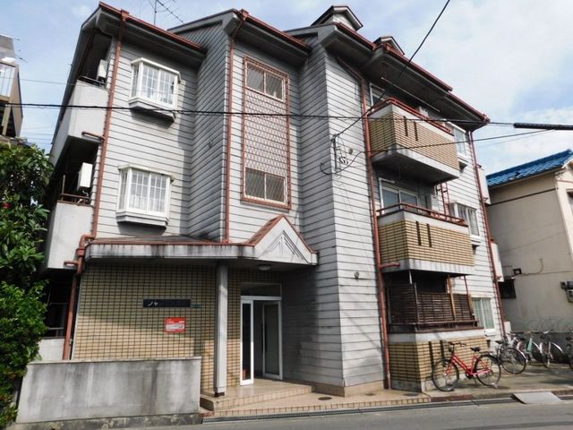 拡大写真：四條畷市南野４丁目 3階302の外観写真（昼）