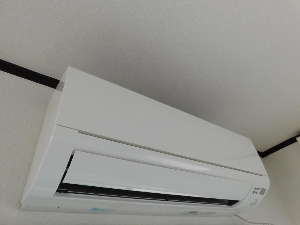 拡大写真：クアルト香里園 3階302のエアコン