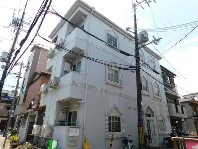 拡大写真：クアルト香里園 3階302の外観写真（昼）