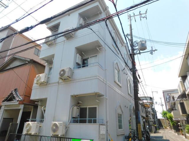 拡大写真：クアルト香里園 3階302の外観写真（昼）
