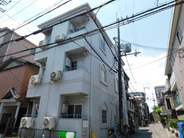 拡大写真：クアルト香里園 3階302の外観写真（昼）