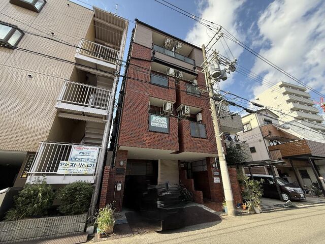 拡大写真：守口市文園町 3階C1の外観写真（昼）