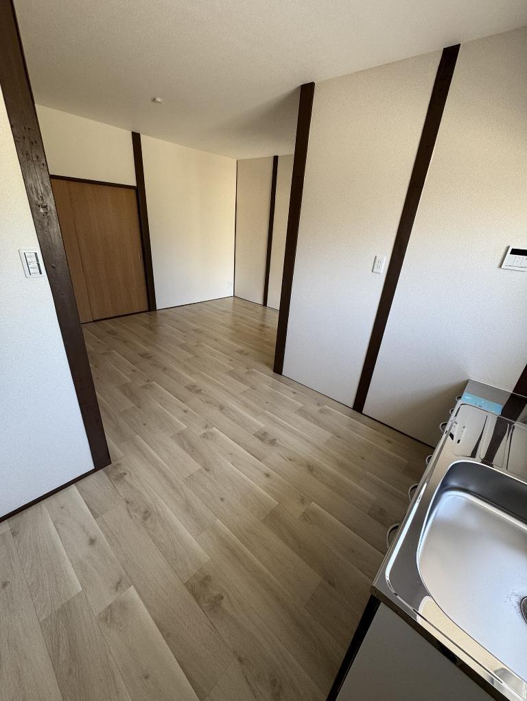 拡大写真:寝屋川市萱島東2丁目 1階1のリビング