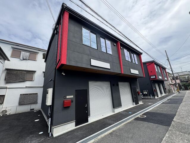 拡大写真:寝屋川市高柳5丁目 1階01の外観写真(昼)