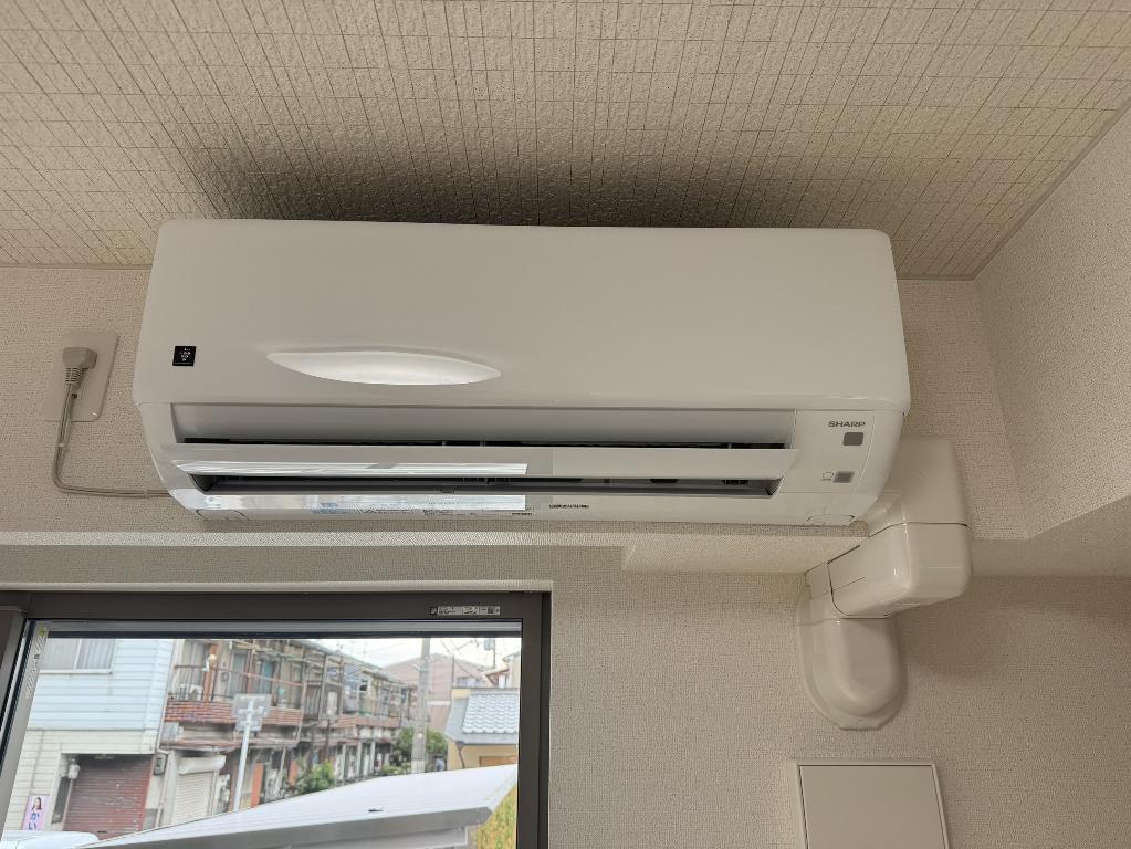 拡大写真:ベル ファミーレ 1階106のエアコン