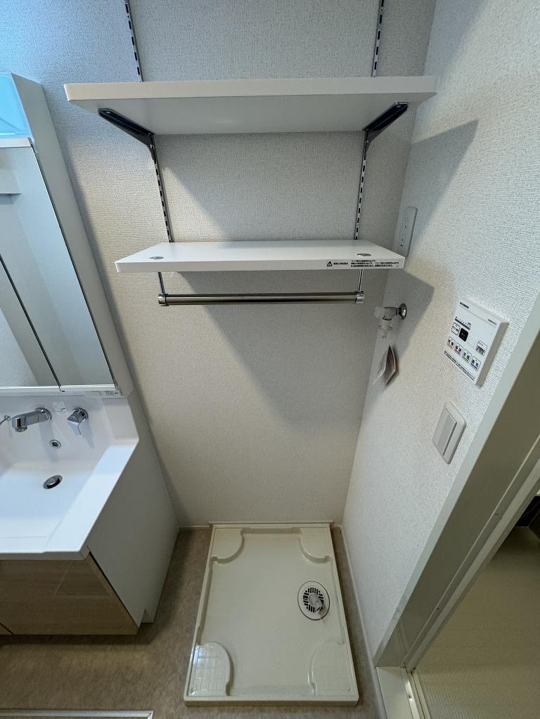 拡大写真:ベル ファミーレ 1階106の洗濯機置場