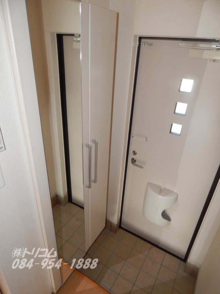 拡大写真：サンシティ曙　Ａ棟 1階102の玄関