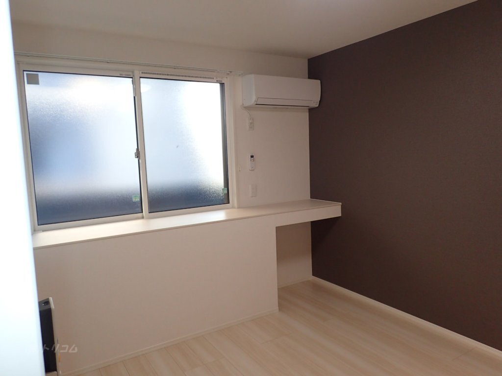 拡大写真:D-residence西町 3階302の寝室エアコン