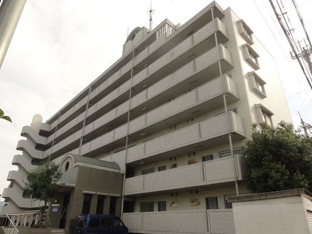 拡大写真：城陽市富野西垣内 6階608の外観写真（昼）