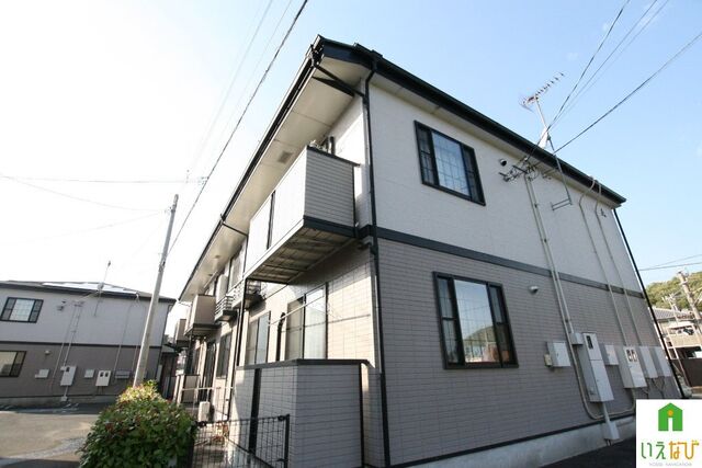 拡大写真：高松市国分寺町新居 1階101の外観写真（昼）