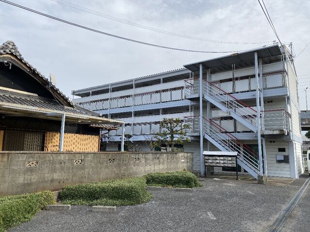 拡大写真：Mhouse 2階206の外観写真（昼）