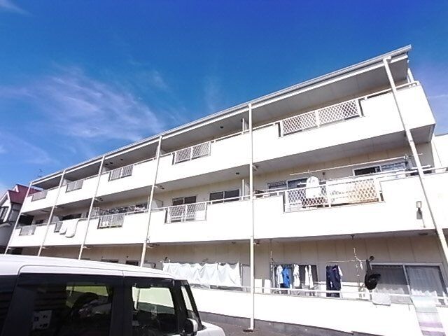 拡大写真：ウィングヒルズ羽曳野 2階0202の外観写真（昼）