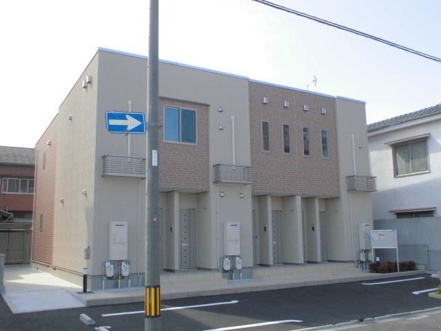 拡大写真：サニーガーデンＥ 2階202の外観写真（昼）