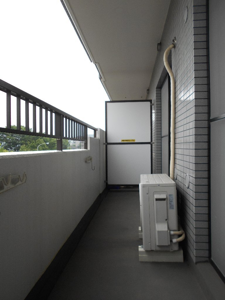 拡大写真：コーポラストマト 3階302のベランダ