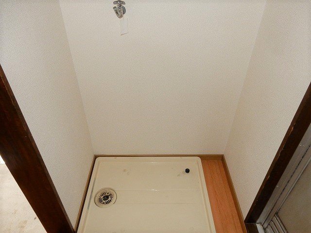 拡大写真:ファミーユ21 2階202の洗濯機置き場