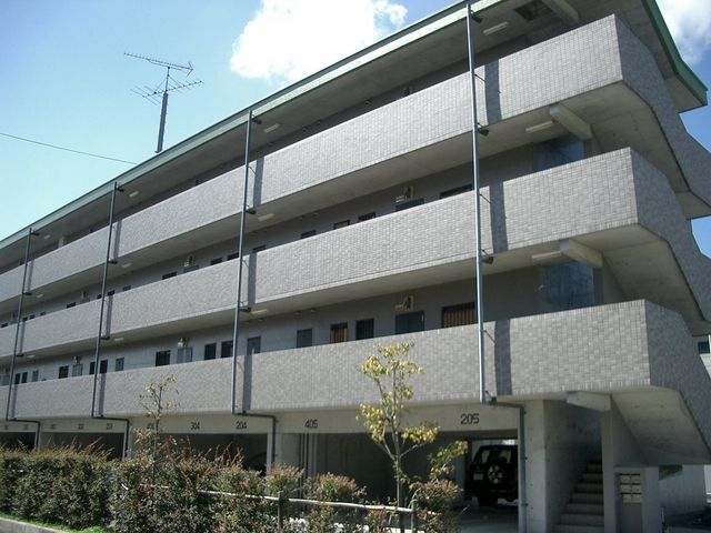拡大写真：豊川グリーンハイツⅡ 3階302の外観写真（昼）
