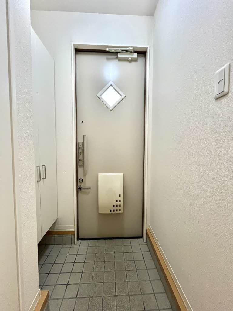 拡大写真:シャーメゾンひかり 1階102の玄関