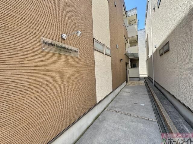 拡大写真:フジパレス住ノ江駅南V番館 1階103の外観写真(昼)