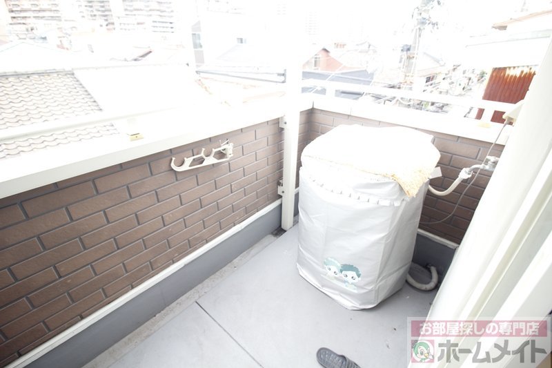 拡大写真：カーサテンプラード 3階3Bの洗濯機置場