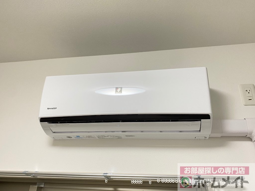 拡大写真:グランパシフィックPINE Luxe 2階205のエアコン