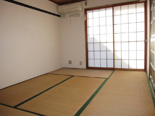 拡大写真:上越市加賀町 1階101の寝室