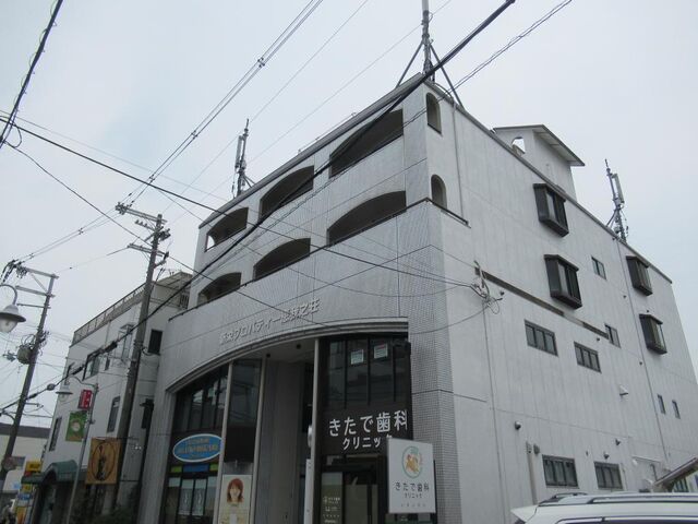 拡大写真：新栄プロパティー恵我之荘 1階103の外観写真（昼）